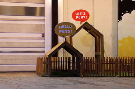 Pet Playground, pet house and artificial turf surrounded by the fence.の写真素材