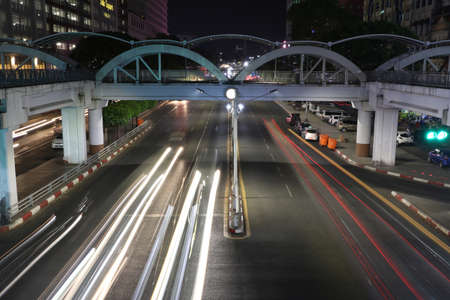 Yangon, Myanmar Feb 21, 2019: Night time and speed of light at Square foot overpass on the crossroad of Anawrahta Rd. and Sule Pagoda Rd. Yangon.のeditorial素材
