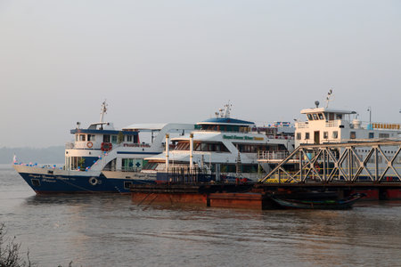Yangon, Myanmar, Feb 25, 2019: Large passenger ship docked at the bridge of harbor in Yangon river...