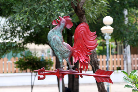 rooster weather vane with arrow and weathercock. It uses advanced aerodynamic theories as tested under fluctuating wind.の写真素材