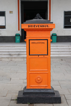 Orange retro mailbox place at the Fatahilah Square in Jakarta,  Indonesia. Dutch Language...