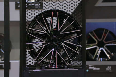 Alloy Wheel of car on the shelf. Alloy wheels are wheels that are made from an alloy of aluminium or magnesium. Alloys are mixtures of a metal and other elements.の写真素材