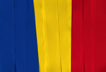 Colorful ribbon as Romania national flag, a vertical tricolor of blue yellow and red.の写真素材