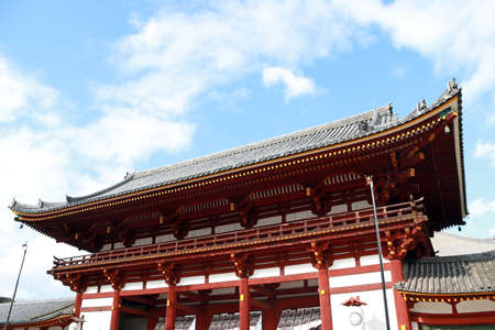 Zoshicho, Nara, Japan, November 21, 2017 : The second antique wooden archway entrance of Todaiji temple with green tree and blue sky background.のeditorial素材