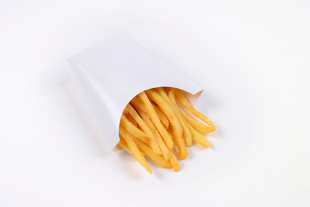 Fast food french fries isolated on white background.