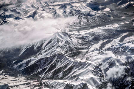 Winter landscape snow mountain high angle view from airplane Leh Ladakh India.の写真素材