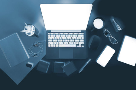 Flat lay x-ray photo of Office table with laptop computer, notebook, digital tablet, mobile phone,...