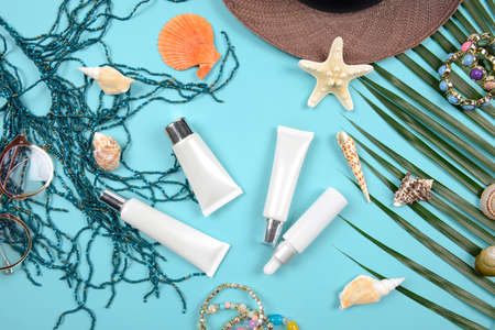 Summer and sunscreen, Beauty cosmetics product for skin care and women accessories on the beach. (Sun protection product concept)の写真素材