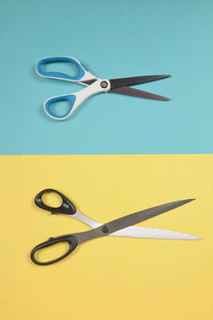 Flat lay of scissors on two tone background, Sewing and needlework concept.の写真素材