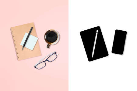 Flat lay photo of office table with notebook and digital tablet and accessories. on modern two tone (white and pink) background. Desktop office mockup concept.の写真素材