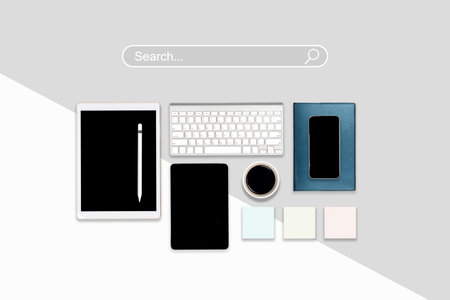 High angle view of a setting table with digital equipment and accessories of business workplace on...