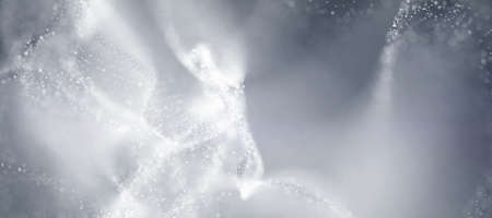 Bokeh Abstract shiny light and glitter with de focused. Glitter light background, Gold, White, Blue bokeh glitter sparkle background. Bokeh light effect creative background.の写真素材