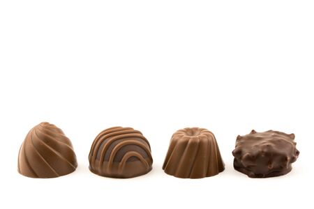 Assorted chocolates on white backgroundの写真素材