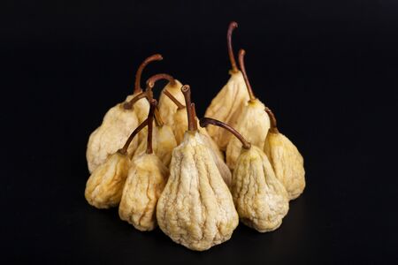 Dried Pears on Black Backgroundの写真素材