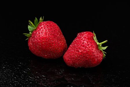 Strawberries on Black Backgroundの写真素材