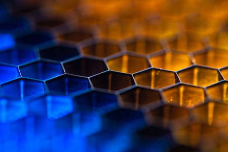 Shiny blue and yellow comb backgroundの写真素材