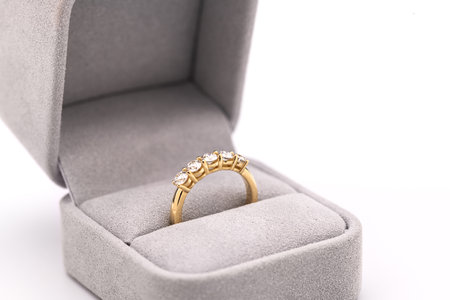 Jewelry ring in gift box on white background, closeupの写真素材