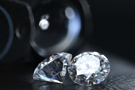 Brilliant diamonds on a black background, close-up.の写真素材