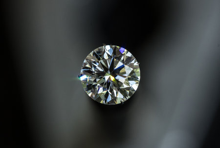 Close up of a diamond on a black background. Jewelry background.の写真素材