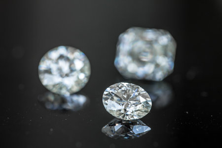 Diamonds on a black background. Jewelry background. Macro.の写真素材