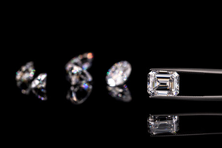 Diamonds on a black background. Jewelry background. Macro.の写真素材
