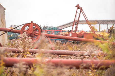 The place is a tower cranes and machinery.の写真素材