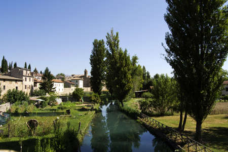 ancient village of bevagna from the riverの写真素材