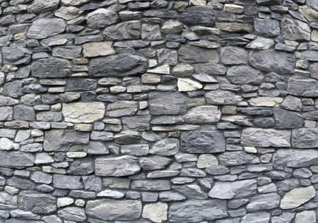 part of a stone wall, for background or texture の写真素材