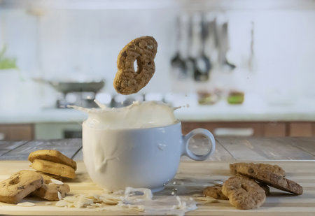wholemeal milk and cookies on the kitchen tableの写真素材