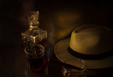 Glass of Whiskey, Straw Hat and Cigarの写真素材