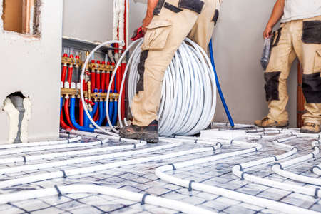 Pipe fitter mounted underfloor heating. Heating system and underfloor heating.Pの写真素材