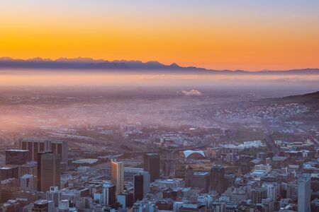 View of Table Mountain and Cape Town City at sunrise on a beautiful morning, Cape Town, South Africaの写真素材