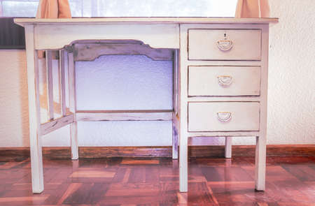 Old White wooden work desk, with three draws, inside a bedroom, South Africaの写真素材