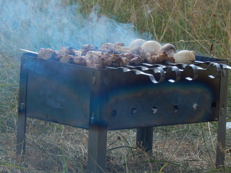 Rest and shish kebabs outdoorsの写真素材