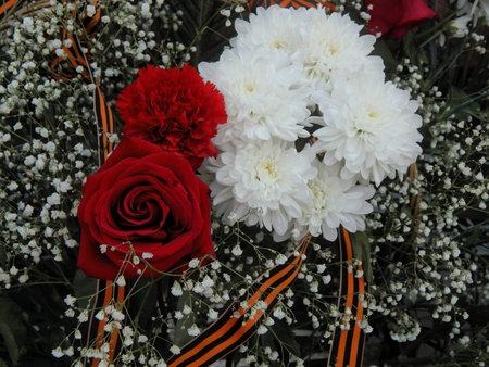 Basket of flowers with St. George ribbon closeup