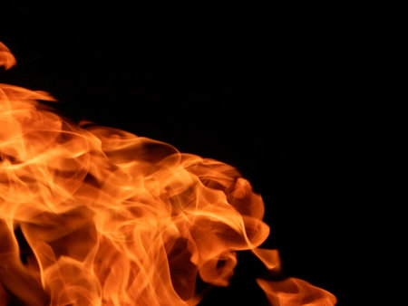 Texture of bright fire flames on a black background
