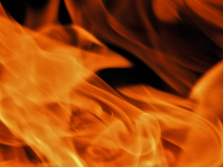 Texture of bright fire flames on a black background