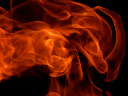 Texture of bright fire flames on a black background