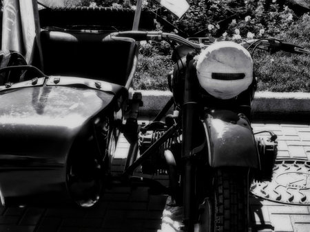 Motorcycle of the Great Patriotic War. Picture in retro style with the effect of softness