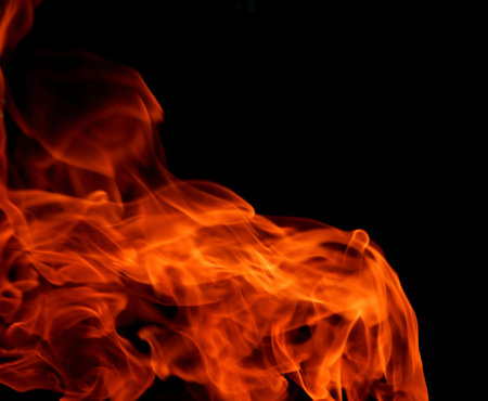 Texture of bright fire flames on a black background