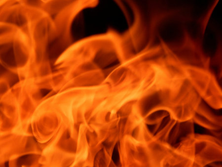 Texture of bright fire flames on a black background