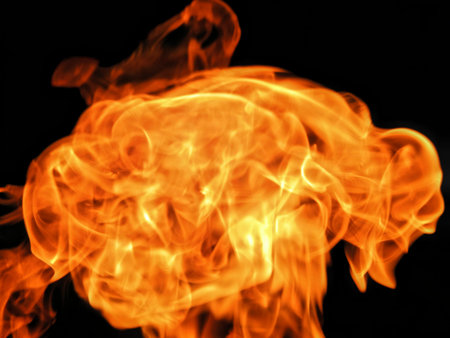 Texture of bright fire flames on a black background