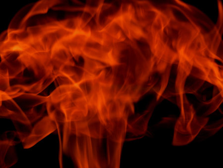 Texture of bright fire flames on a black background