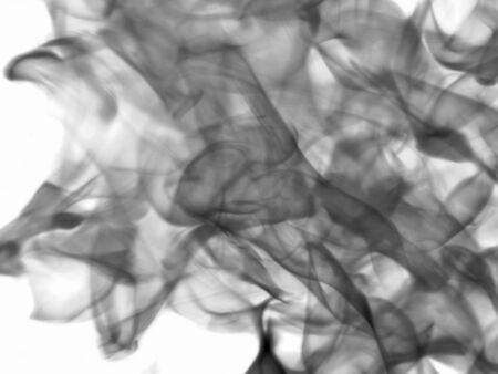 Texture of black smoke at the white backgroundの写真素材
