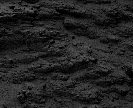 The texture of the dark building sand closeupの写真素材
