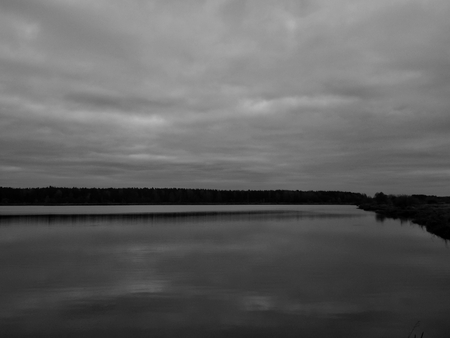 Beautiful autumn lake in black and white photographyの写真素材