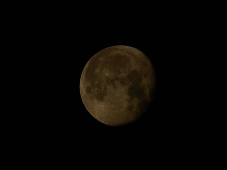 Moon in the night sky close upの写真素材