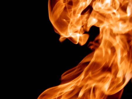 Red fire flames on a black backgroundの写真素材