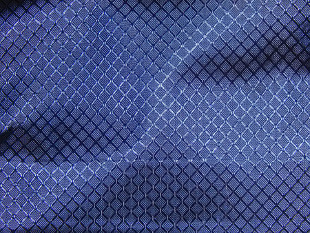 The surface texture of blue material closeup
