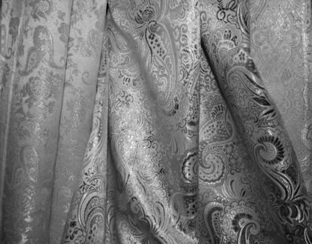 White silver satin material for wedding dress close-upの写真素材